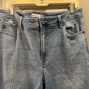 Distressed jeans by Kancan